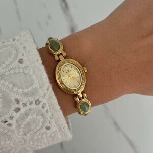 Sku:0357 cute gold watch bracelet with green natural stone inserts+in a gift bag